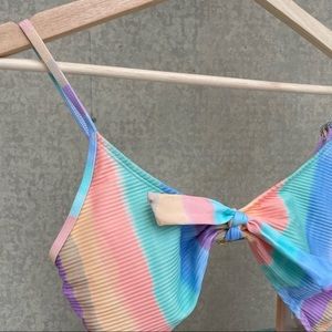 One-piece swim suit in pastel colors